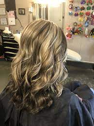 White Blonde Thin Slices With Chunk Dark Brown Slices On Top And Blonde Hair With Brown Underneath Dark Brown Hair With Blonde Highlights Brown Hair Underneath