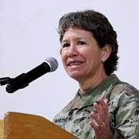 Lt. Col. Nathan Acree holds a card that was included