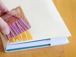 For the cover, choose a piece of paper 2.5x longer than the flat book, so the single long piece of paper can wrap front to back. Diy Super Cool Book Covers