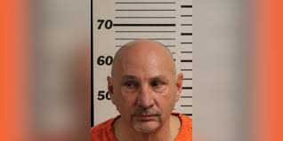 Man charged with secret peeping at fitness center, police say