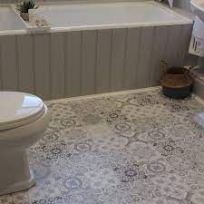 Floor tiles bring a timeless look and feel to any space, connecting the ground that you walk on day in, day out. Liberty Floors Aurora 8mm Ornate Ivory Tile Laminate Flooring 47548 Leader Floors