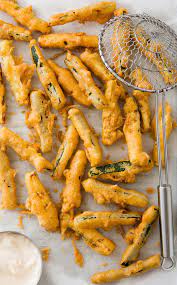 Fried Zucchini Sticks For A Summery Twist Swap Your Typical French Fries For Our Fried Zucchini Sticks Zucchini Fries Zucchini Sticks Fried Zucchini Recipes