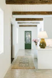 For added strength, hammer your nails in on an angle. Interior Design Studio Tour Aka Life Goals Lark Linen Wood Beam Ceiling Wood Doors Interior Interior Design