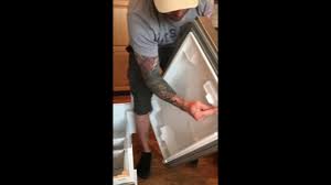 how to remove freezer drawers on