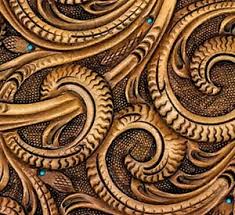 Floral sheridan panel, me, carved leather, 2021. Leather Floral Designs And Flow Don Gonzales Saddlery
