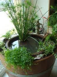 whiskey barrel ponds what an inspiring small space landscape idea containerwatergardens whiskeybar container water gardens aquaponics system aquaponics