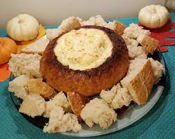 Take the bread and hallow it out and take all the rest of the ingredients and mix well together and put in the centre of the bread. Hot Onion Cheese Dip Bread Bowl Appetizer This Old Gal
