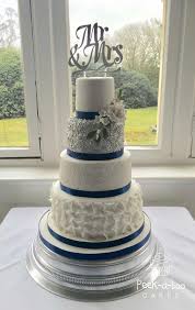 A white wedding cake with a textural and a polka dot tier plus black ribbons is a fresh take on classics. Wedding Cakes Www Peek A Boocakes Co Uk