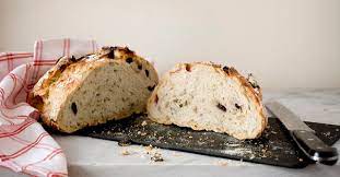 The Famous Ny Times No Knead Bread A Stack Of Dishes No Knead Bread Bread Baking