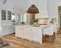 Mar 27, 2018 · since i can't share the stuff for my own house while it's making it's way to me on a blessed brown truck with my saint of a ups man, i thought we would pop back over to my parent's house today and share the coastal paint colors we used throughout their home renovation. White Beach Style Kitchen With Shiplap Home Bunch Interior Design Ideas