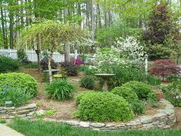 The workaholic and i love to eat out. Beautiful Blooming Garden Designscapes Of Nc Landscaping Design Installation And Maintenance Raleigh North Ca Landscape Design Woodland Garden Landscape
