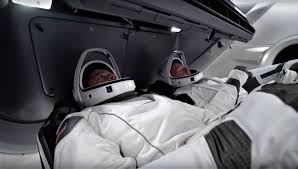 Two crossed lines that form an 'x'. Spacex S First Crew Dragon Nasa Astronauts Suit Up For Spacesuit Focused Launch Rehearsal