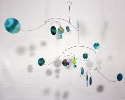 Calder pioneered kinetic sculpture with his wafer thin mobiles that can be moved by a child's breath. Galaxy Mobile Sculpture Cool Design For Your Cool Home Mobile Sculpture Mobile Art Sculpture