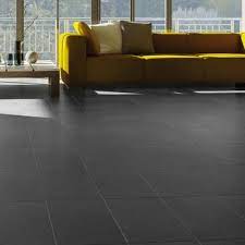 The utmost planning and creative expression of an interior design for balanced living spaces in colour and shape. Black Living Room Tiles Marazzi