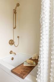 You can give any tray a new lease on life. Wood Bathtub Tray With White Tassel Shower Curtain Transitional Bathroom