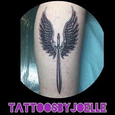 Black and gray battle valkyrie tattoos. Valkyrie Wings On A Badass Momma Valkyrie Valkyriewings Wings Wingtattoo Valkyrietattoo Valkyriewin Sword Tattoo Sword Tattoos For Women Tattoos