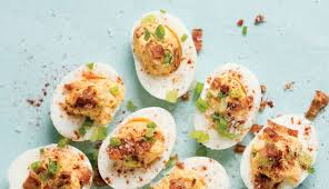 There are 64 calories in 1 serving, 1/2 egg of deviled egg (large egg), cooked. Recipe Bacon Stuffed Deviled Eggs