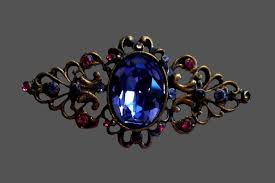 The three graces carries a rare collection of antique wedding and engagement rings, pendants, necklaces, earrings and more. Purple Cabochon Classic Victorian Design Brooch Brass Tone Fuchsia Rhinestones Kaleidoscope Effect