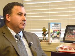 Campbell assistant dean helps rescue man from submerged car