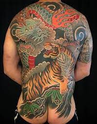 Cool japanese style tattoo designs and ideas for guys: Japanese Tiger Tattoos Meanings Tattoo Ideas More