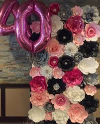 I chose a simple black and white color scheme with a pop of soft pink. Paper Flower Backdrop 40 And Fabulous In Pink Black Grey And White White Paper Flowers Paper Flower Wall Paper Flower Backdrop
