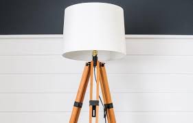 Spray paint the top ring of the lamp shade that you ripped apart, 3 cable clips and screws that go with them, and your cord in the color of your choice. How To Make A Floor Lamp Out Of A Tripod Joyful Derivatives