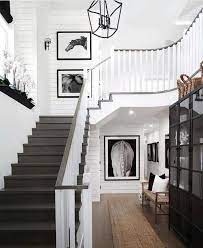 Modern Black And White Farmhouse Entry Shiplap Statementchandelier Blacksteps Minimal Mod Staircase Design Wooden Staircase Design Modern Farmhouse Design