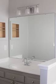 It's really an easy diy project that can easily elevate your bathroom without a lot of money or a lot of effort. How To Frame A Bathroom Mirror Easy Diy Project