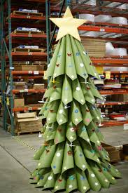 The different colored tables with the bright red candy in the middle the candy cupcake toppers the huge lollipop and striped red tree decorations the glass candy jars the detailed cake and more! How To Make A Merry Paper Christmas Tree Paperpapers Blog