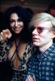 Andy Warhol with his boyfriend Jed Johnson and his superstars Candy  Darling, Brigid Berlin, Geraldine Smith, Gerard Malanga and Ingrid  Superstar at the Factory in 1969. This photo was taken by Pablo