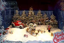 Winter wonderland scenery in the alps with snowy mountain summits reflecting in crystal clear mountain lake on a cold. Hamleys Toy Store Unveils Its Winter Wonderland Window Display With The Help Of Matilda The Musical Daily Mail Online