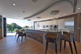 If you are looking to soften the end of a kitchen run, so that it matches the curves of the worktop above it, then a curved base unit will help you do that. Diane Berry Kitchens Auf Twitter It S All About The Curve On This Eggersmann Uk Kitchen Units Fitted To Make A Curve On The Tall Run And Island Curved Glass Table Breakfast Bar