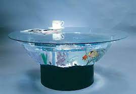 Acrylic aquariums are much lighter, durable and less prone to leaks, and manufacturers can bend and shape tanks into many different forms, such as corner units, bow front tanks, globes, hexagons and even creatively designed betta tanks! Most Elegant Coffee Tables With Built In Aquarium Hometone Aquarium Coffee Table Fish Tank Coffee Table Elegant Coffee Table