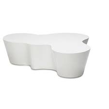 Featured in seamless organic shape and timeless form, the coffee table has become a symbol of modernism for over the past 60 years. Organic Shaped White Lacquer Coffee Table Mecox Gardens