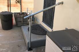 Hand rails shall be provided at the top of both sides of each ladder and recessed steps and shall extend over the coping or edge of the deck. 14 Exterior Handrail Ideas Simplified Building