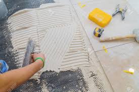 Gograph allows you to download affordable illustrations and eps vector clip art. Floor Tiles Installation Ceramic Tiles And Tools For Home Improvement Renovation Stock Photo Picture And Royalty Free Image Image 114441749