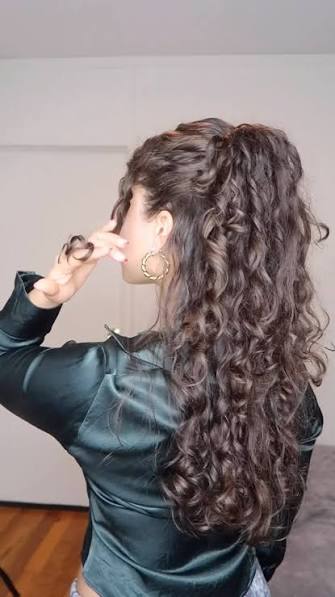 Voluminous Curly Ponytail