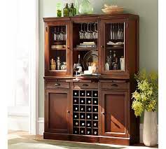 A popular choice for basement bar cabinets is the white shaker. Modular Bar Collection Pottery Barn