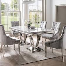 The Arturo Is A Contemporary Dining Table The Unique Marble Table Top Is Supported By Billowed Stainless Dining Table Marble Glass Dining Table Marble Dining