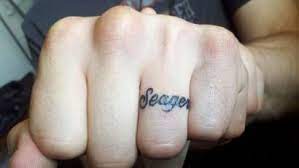 One of the most common finger tattoos is ring tattoos. Name Ring Tattoos Google Search Ring Finger Tattoos Finger Tattoos Wedding Band Tattoo