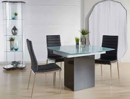 With the ability to provide additional seating and surface space, this type of table is ideal for everything from quiet weeknight dinners to big holiday celebrations and dinner parties. Quadrato Extension Dining Table Contemporary Glass Tables