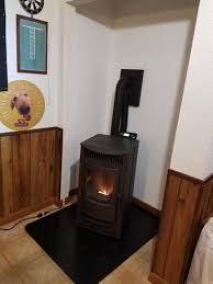 Castle 1 500 Sq Ft Pellet Stove With 40 Lb Hopper And Auto Ignition 12327 The Home Depot Pellet Stove Stove Installation Corner Wood Stove