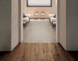 Learn about the different types of flooring, including hardwood, laminate, vinyl and tile, to find the best flooring materials for your home. Living Room Floor Inspiration For Your Furniture Marazzi