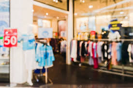 Abstract Blurred Background Of Fashion Store With Red Discount 5 Stock Ad Background Fashion Abstract Blurred Ad