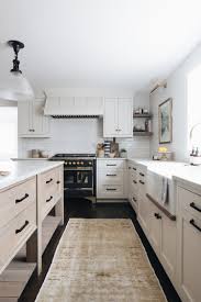 Kitchen designers have long said that white is timeless, but there is a right way to do it. The Best Sources For Modern Minimal Cabinet Hardware Kitchen With French Cooking Range The Identite Coll Timeless Kitchen Classic Kitchens Kitchen Design