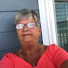 Decorating a hallway niche with DIY projects and navy accents