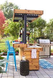 The lounging area's outdoor umbrella is portable and can be used where needed, including at the bar/kitchen. 1001 Ideas For Cool Outdoor Bar Ideas To Enjoy This Summer