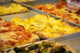 Slice pizza app, new york, new york. Close Up View Of A Rectangular Pizza Slice Stuffed With Potatoes Tomato And Cheese By Valerio Rosati Photo Stock Snapwire