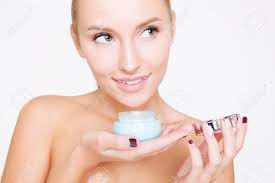 Your destination for cosmetics, beauty & fragances. Female Face Cream Portrait Of The Women Holding Tank For Cream Stock Photo Picture And Royalty Free Image Image 65288867