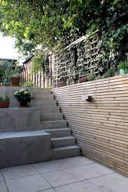Milton New External Terrace Area With Cast Concrete Steps Leading To Garden Sloped Garden Terraced Patio Ideas Garden Steps